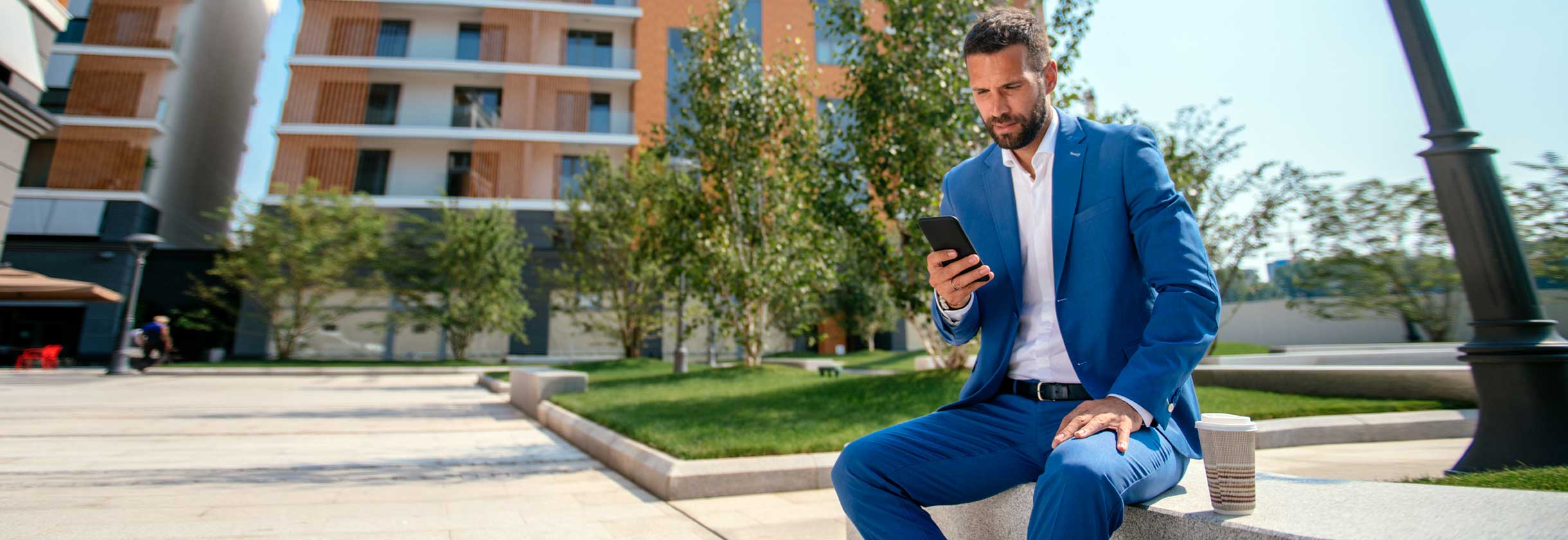 SouthState client checking money market rates on phone